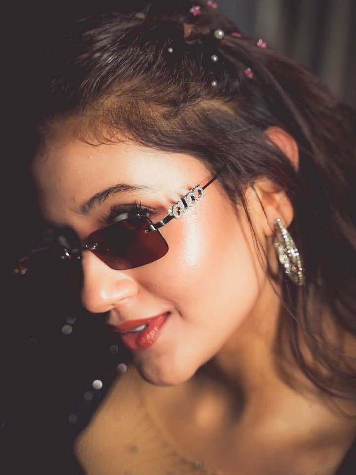 Anjali Arora — Defence Colony, New Delhi showtime appearance | TKC Talent Anjali Arora at a Defence Colony, New Delhi showtime event in a black sequin outfit and tinted Gucci shades — book Anjali Arora for club nights and brand events via TKC Talent.
