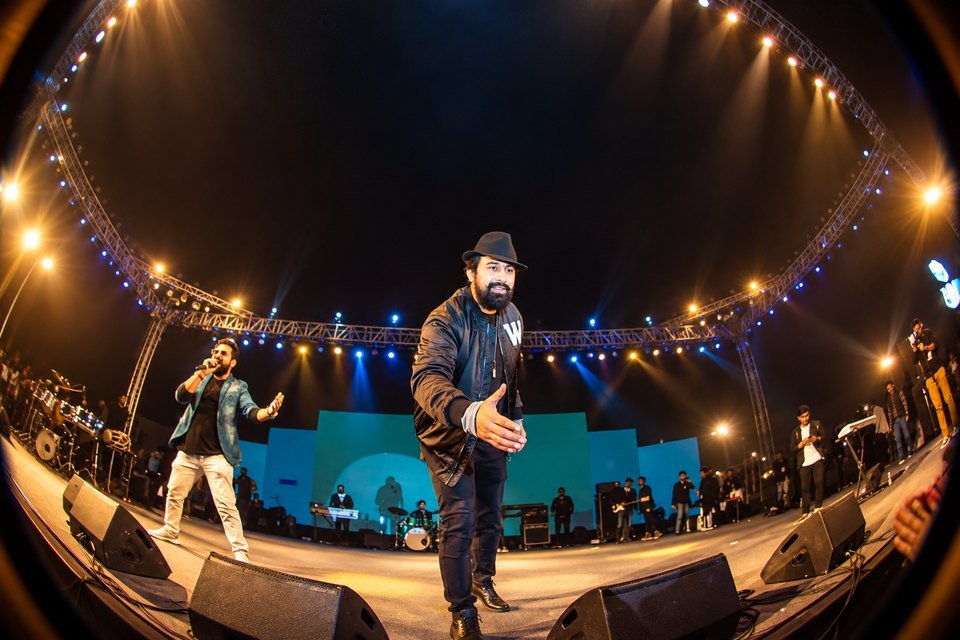 Male DJ performing at a concert — The Kabir Company Male DJ performing at a concert organized by The Kabir Company