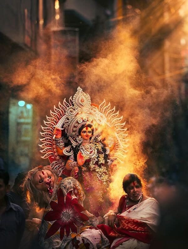 Dhak drummers and dhunuchi smoke during Durga Puja celebrations at CR Park, Delhi Dhak drummers and dhunuchi smoke during Durga Puja celebrations at CR Park, Delhi
